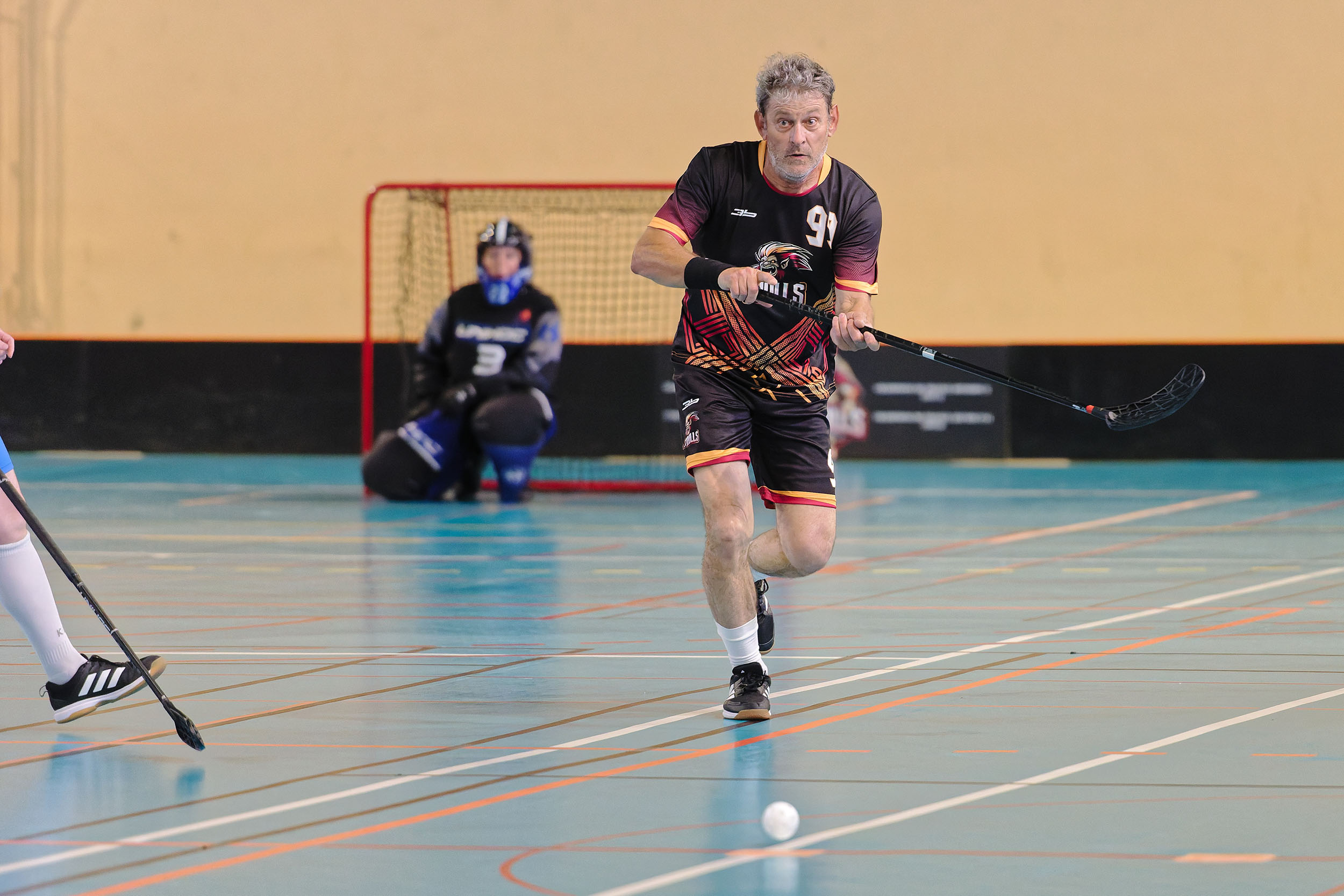 Joueur n°99 des Trolls en pleine course